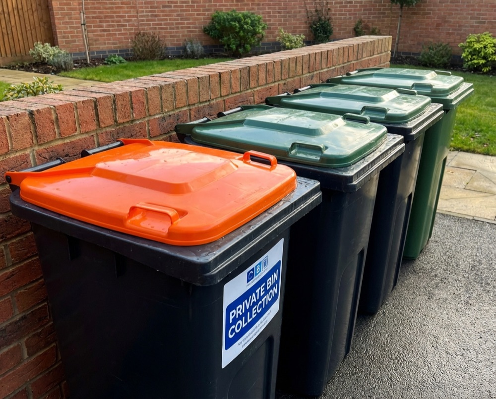 Recycling and general waste bins on a Selsey street