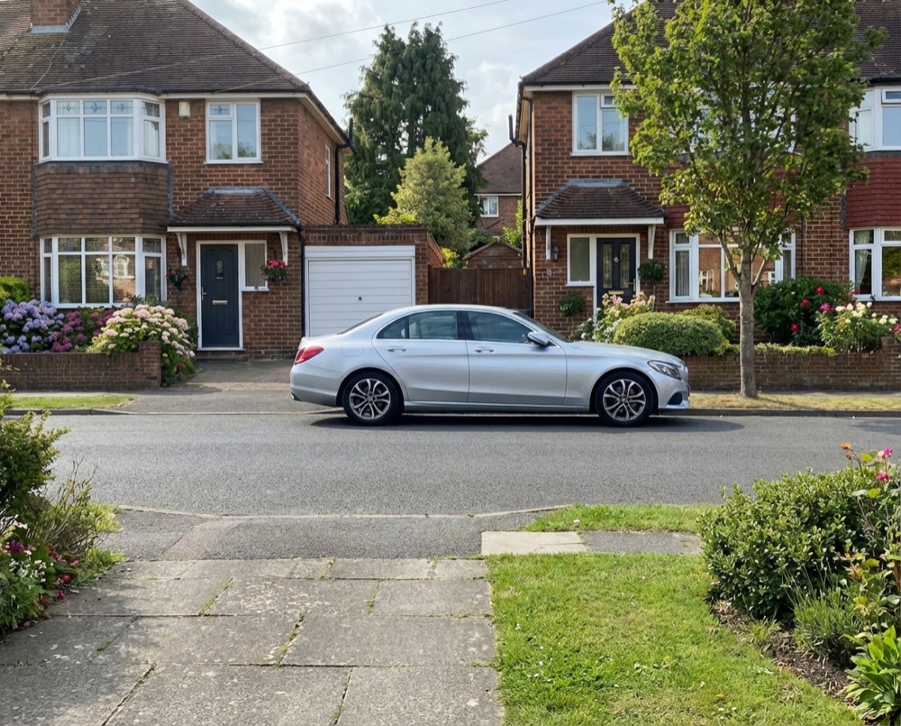 Residential street in Selsey with wheelie bins